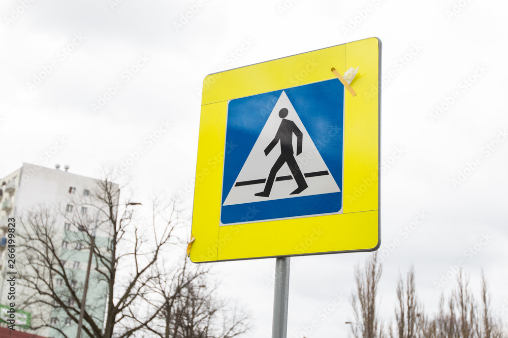 crossing sign for pedestrians on the street crossing sign for pedestrians on the street