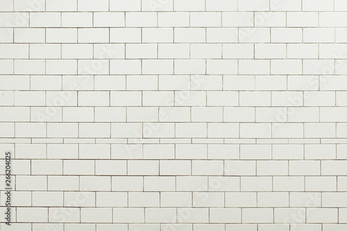Old white tile wall background texture