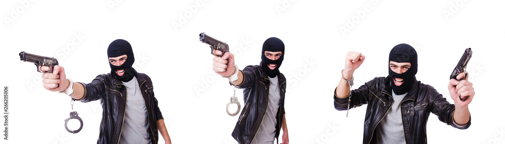Man with gun and handcuffs on white