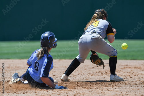 Photography High School Softball Players making plays during a game