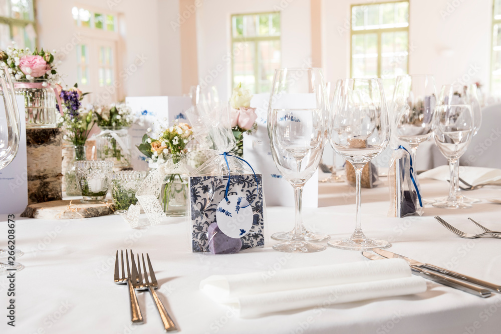 wonderfully bright room for a wedding covered with glasses cutlery and cards with text free space wonderfully bright room for a wedding covered with glasses cutlery and cards with text free space