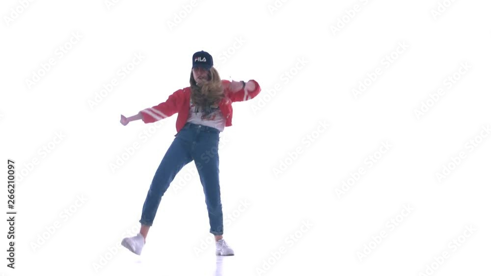 Young beautiful girl dancing hip-hop, street dancing on white background, isolated Young beautiful girl dancing hip-hop, street dancing on white background, isolated