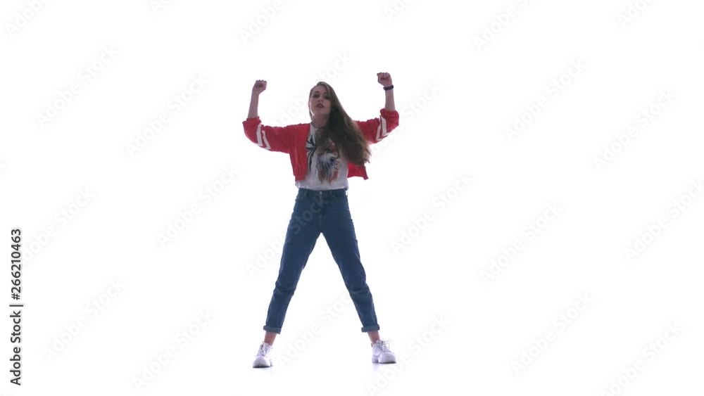 Young beautiful girl dancing hip-hop, street dancing on white background, isolated Young beautiful girl dancing hip-hop, street dancing on white background, isolated