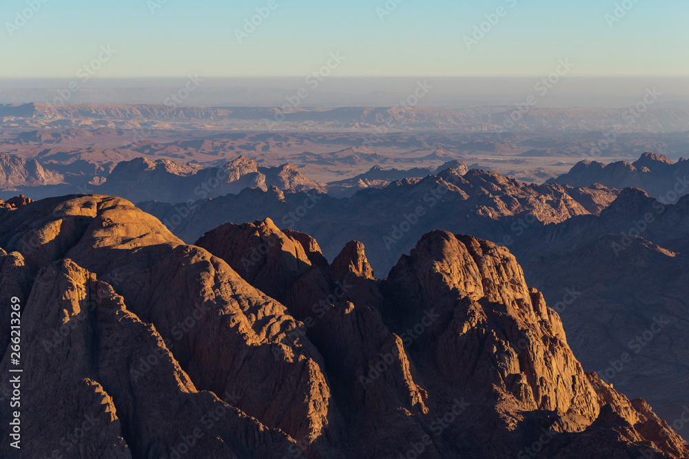 Egypt. Mount Sinai in the morning at sunrise. (Mount Horeb, Gabal Musa, Moses Mount). Pilgrimage place and famous touristic destination. Egypt. Mount Sinai in the morning at sunrise. (Mount Horeb, Gabal Musa, Moses Mount). Pilgrimage place and famous touristic destination.