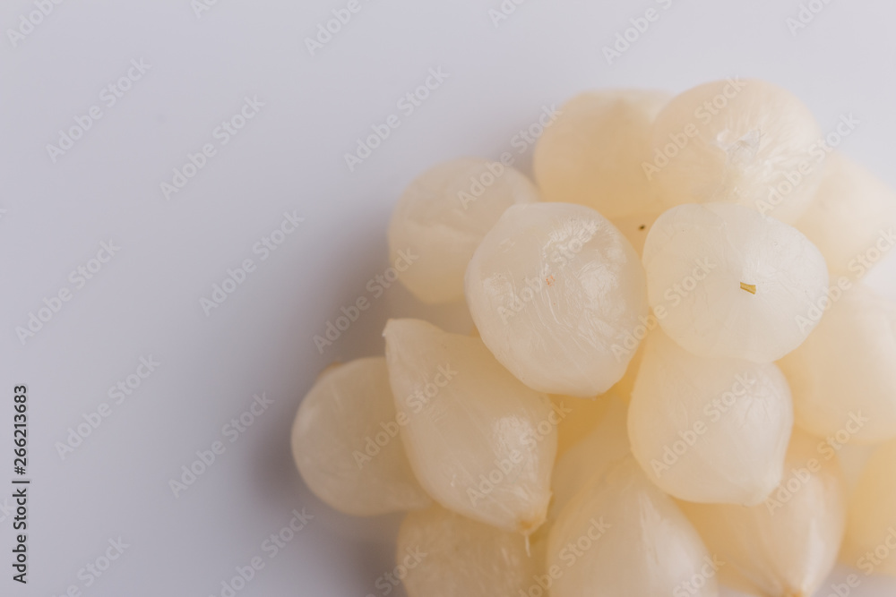 pickled vegetables on a white acrylic background pickled vegetables on a white acrylic background