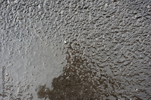 Surface wet asphalt on top