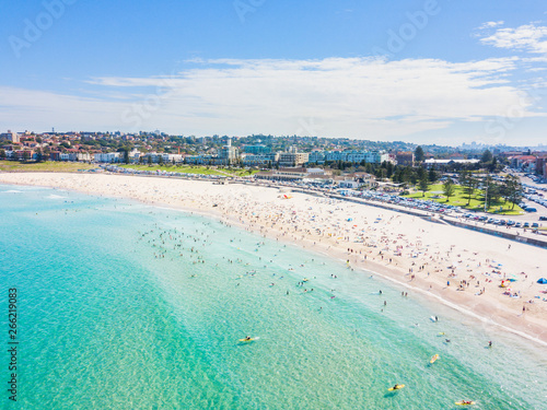 An aerial view of Bondi Beach in Sydney, Australia on a busy day with blue water © Darren