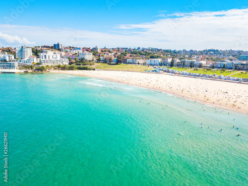 An aerial view of Bondi Beach in Sydney, Australia on a busy day with blue water