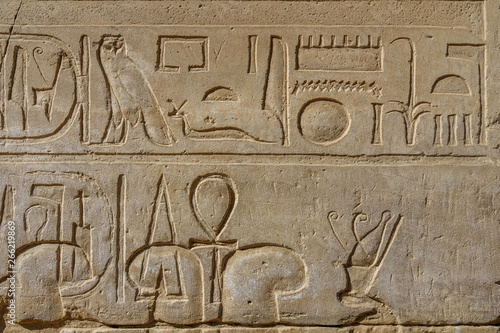 Egyptian ancient hieroglyphs on the stone wall