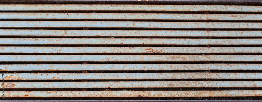 half-rusted rainfall lattice looking like horizontal metal stripes half-rusted rainfall lattice looking like horizontal metal stripes