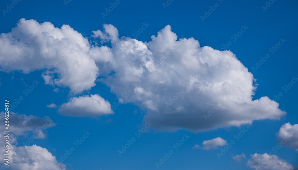 Texture of beautiful spring clouds on the background of blue clear sky Texture of beautiful spring clouds on the background of blue clear sky