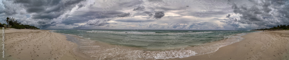Panorama of the beach on a tropical island before the rain