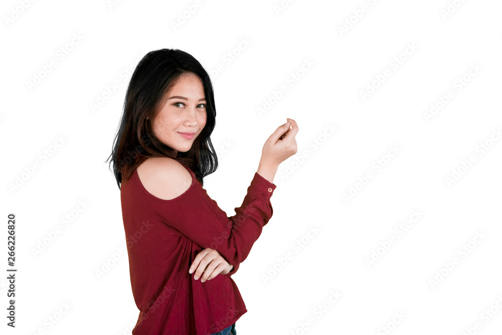 Pretty girl stands with copy space on studio Pretty girl stands with copy space on studio