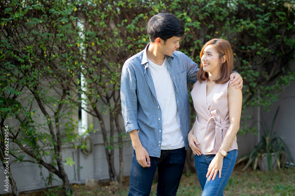 Beautiful portrait couple looking each others eyes and smiling with happy, young asian man and woman relation with love dating, husband and wife feeling and emotion, lovers and lifestyle concept. Beautiful portrait couple looking each others eyes and smiling with happy, young asian man and woman relation with love dating, husband and wife feeling and emotion, lovers and lifestyle concept.