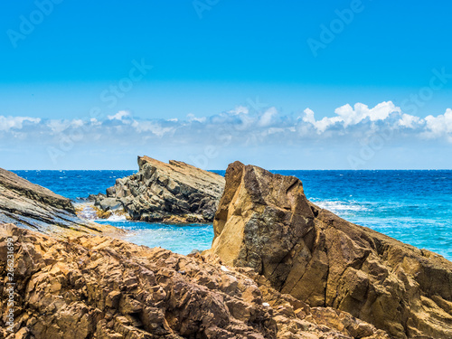 Ocean surf on the rocky beach © oldmn