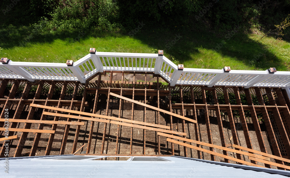 Top view of an aged outdoor wooden cedar deck being tore down due to weathered boards - obrazy, fototapety, plakaty 