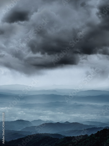 Rainy season in Thailand with mountains and fog natural background.