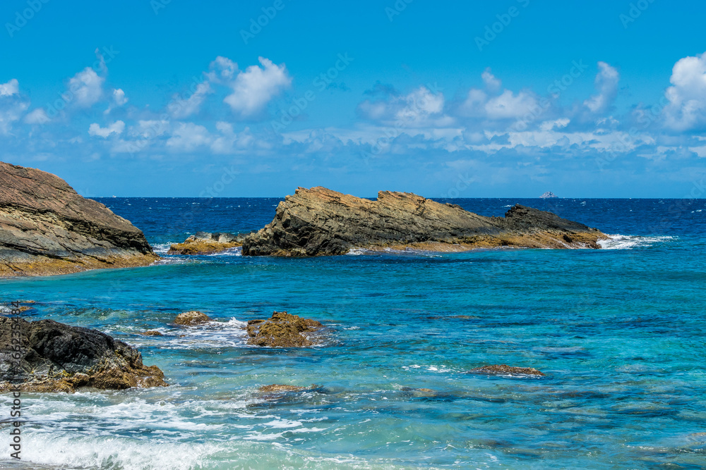 Ocean surf on the rocky beach