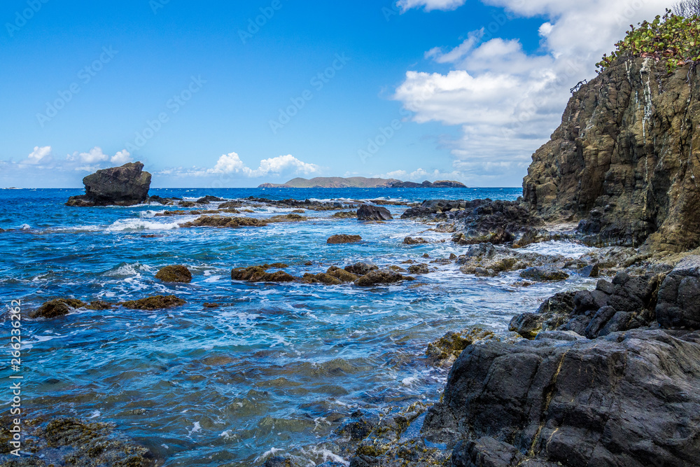 Ocean surf on the rocky beach