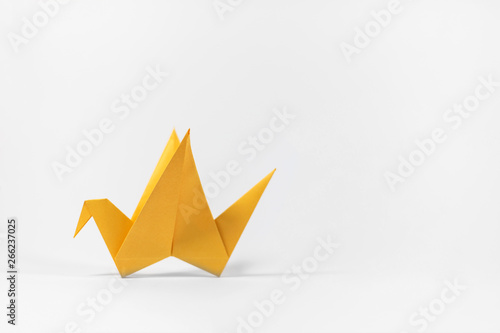 Hand folded origami paper cranes, isolated on a white background