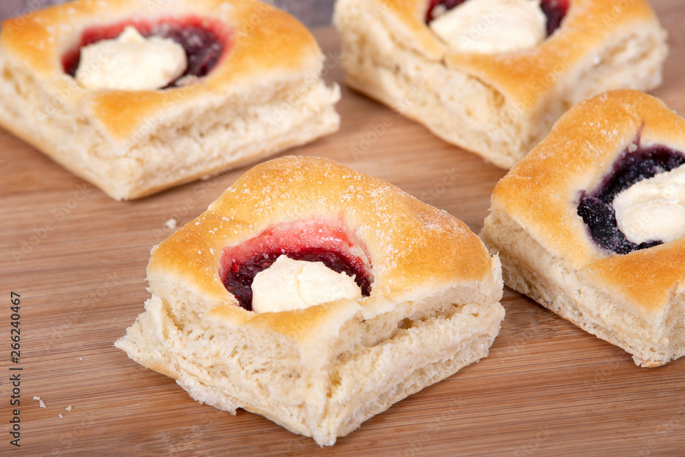 Assortment of sweet Kolache, Czech pastry cakes, with fruit, berry and cream cheese fillings