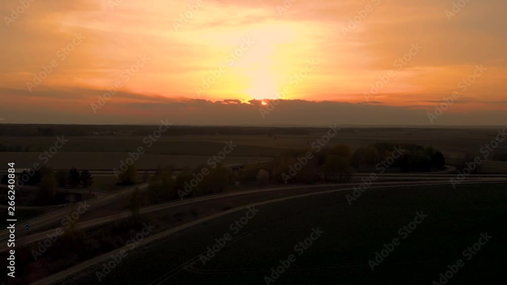 Sunset with higway overpass in foreground Sunset with higway overpass in foreground