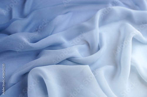 silk fabric texture, background pastel blue color . copy space