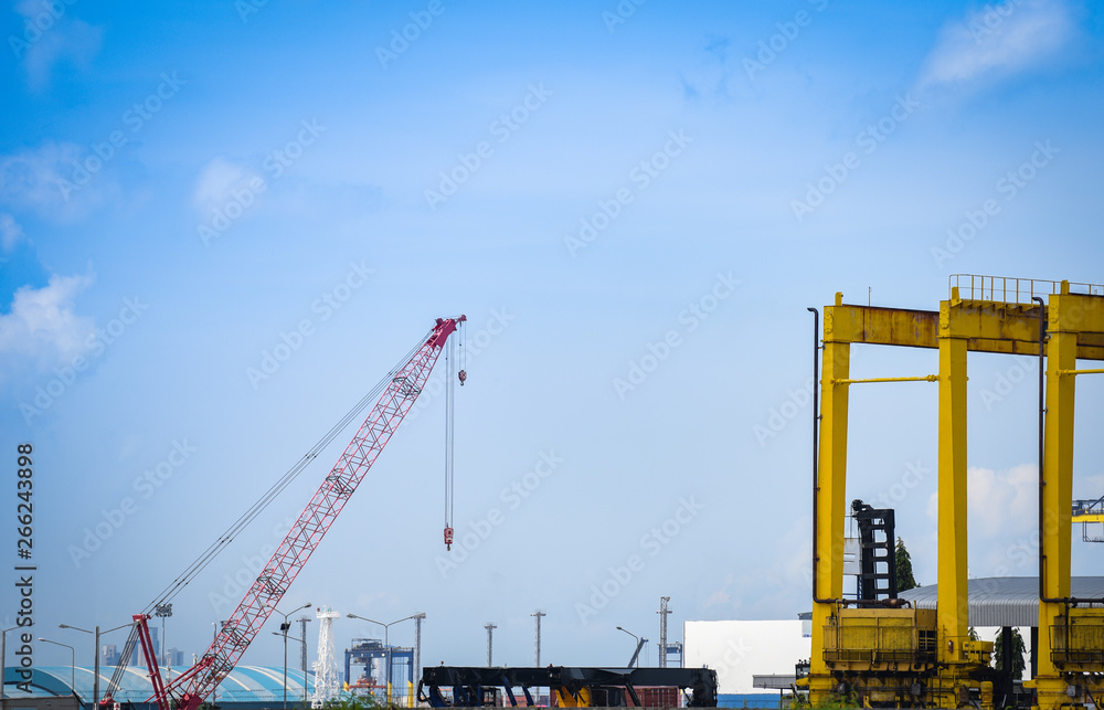 Crane and container ship in export and import business and logistics in harbor industry Crane and container ship in export and import business and logistics in harbor industry