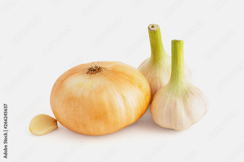 Fototapeta premium Good quality onion bulb and two heads with garlic clove on white background