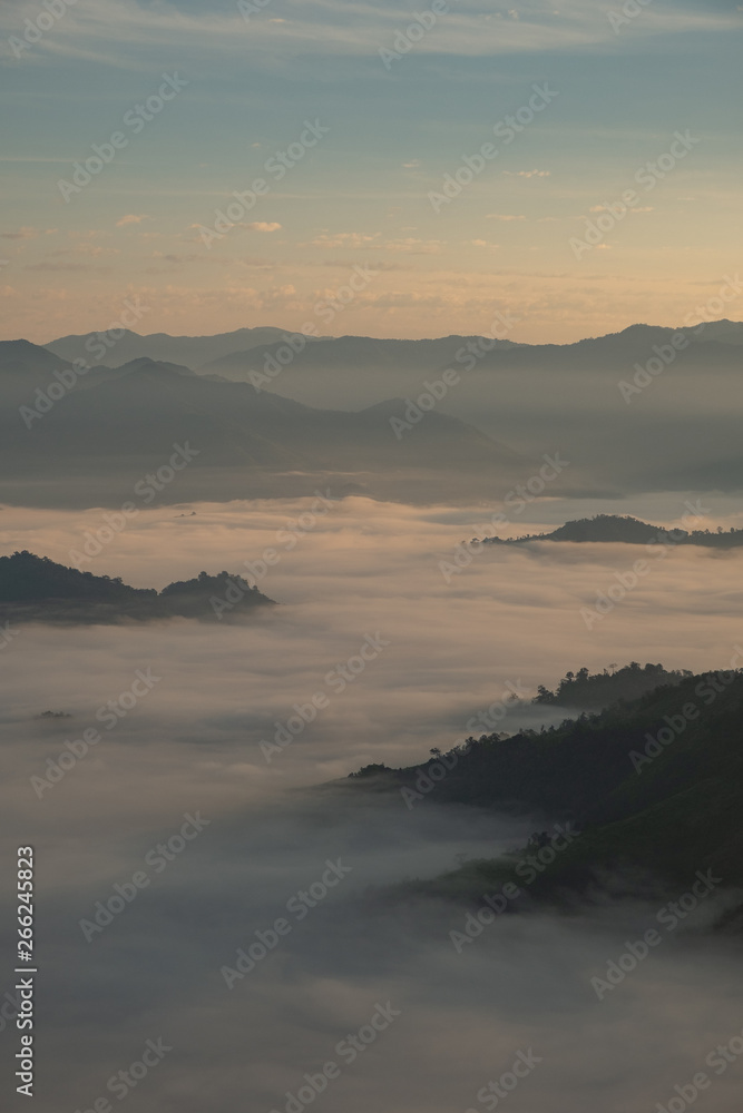 Fog, mountains, sunlight, beautiful mountain tops of the point of view. scenic beauty in the morning. Doi Lorgwador, Mae Moei, Tak in Thailand