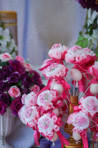 Close-up and selective focus of artificial flower use as wedding dais decoration. Wedding dais also known as 