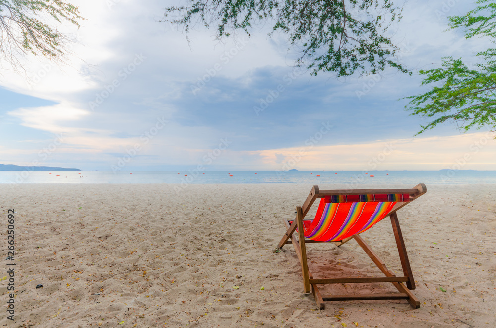 vacation on summer in Thailand. chair on the beach with sea and blue sky background. vacation on summer in Thailand. chair on the beach with sea and blue sky background.