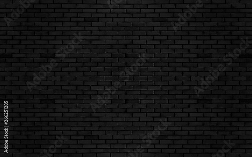 Valokuva Black color brick wall for brickwork background design .