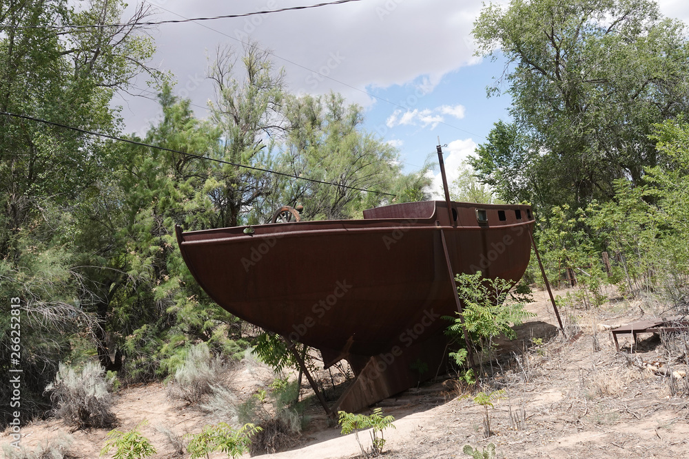 old boat in the middle of knowhere old boat in the middle of knowhere