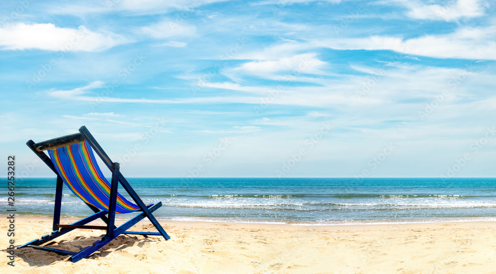 View of the chair on the beach, blue sky Summer vacation concept Consists of travel websites View of the chair on the beach, blue sky Summer vacation concept Consists of travel websites