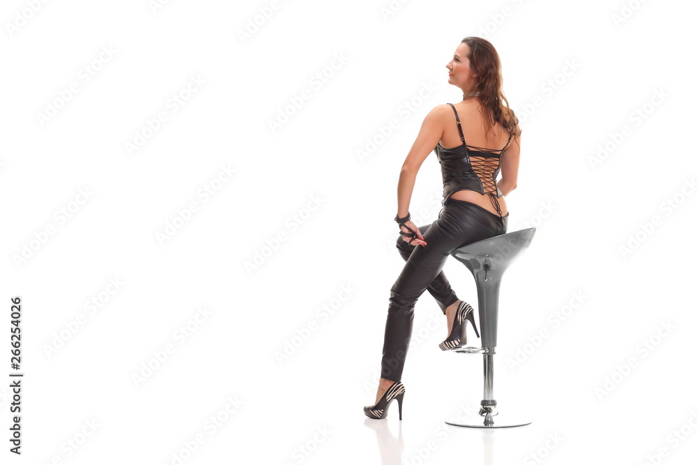 young sexy girl in black leather jumpsuit