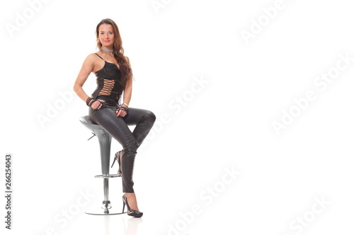 young sexy girl in black leather jumpsuit
