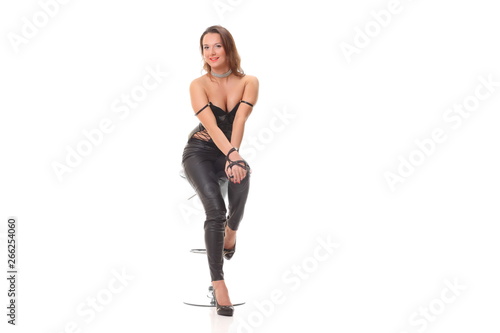 young sexy girl in black leather jumpsuit
