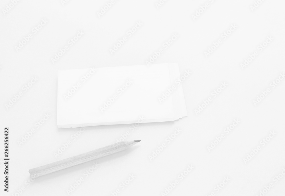 Mockup of business cards on white textured paper background Mockup of business cards on white textured paper background