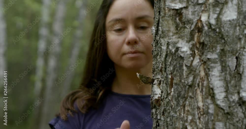 concept of man and nature. Woman hand touches birch-black and white wood. energy supply. Shoot with RED camera. concept of man and nature. Woman hand touches birch-black and white wood. energy supply. Shoot with RED camera.