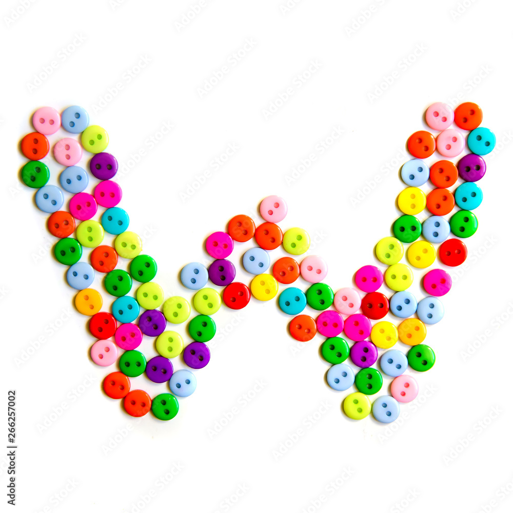 Letter W of the English alphabet made of multi-colored buttons Letter W of the English alphabet made of multi-colored buttons