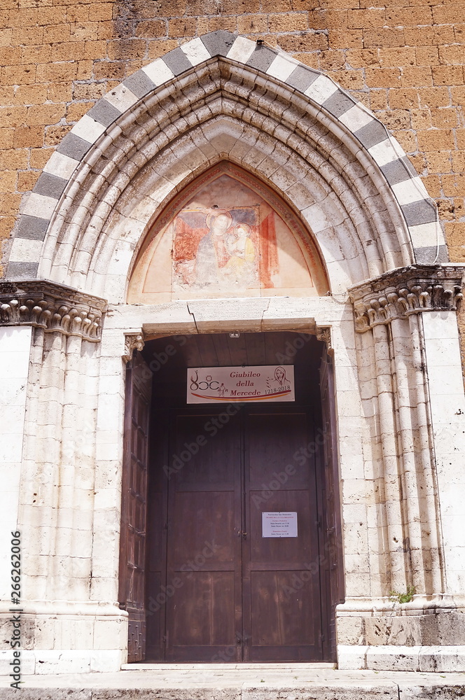Entrance door of San Domenico church, Orvieto, Italy