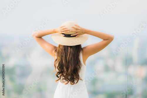 Portrait beautiful young asian woman smile happy and feel free with outdoor background