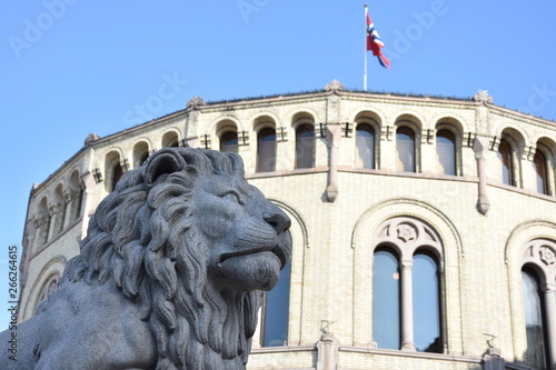 Lion statue next Norwegian parliament Storting Oslo in central Oslo, Norway - Image photo