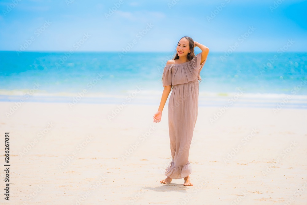 Portrait beautiful young asian woman smile happy walk on the tropical outdoor nature beach sea Portrait beautiful young asian woman smile happy walk on the tropical outdoor nature beach sea