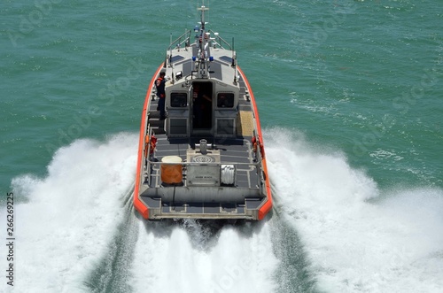 Принти на полотні Angled overhead view of a speeding U.S. Coast Guard patrol boat.