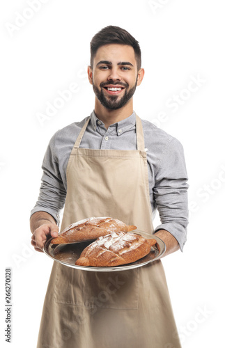 Baker with fresh bread on w...