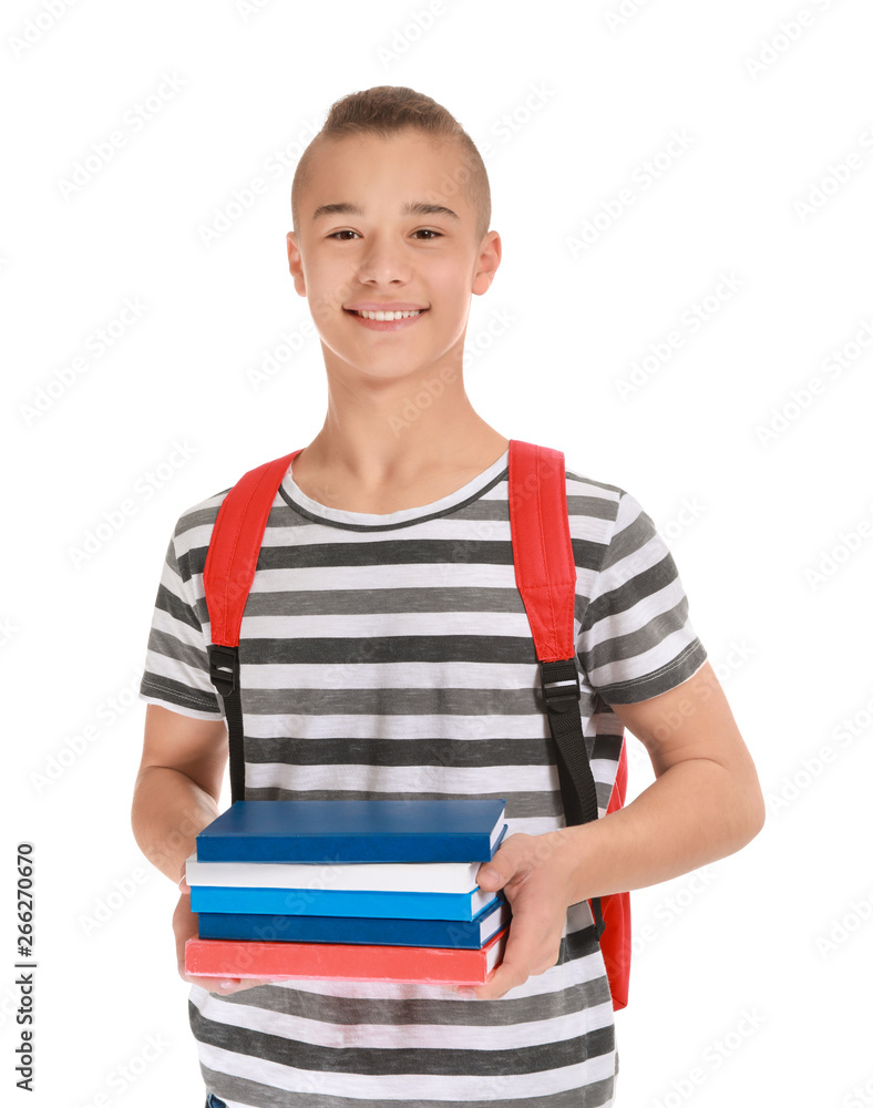 Cute teenage boy with books on white background Cute teenage boy with books on white background