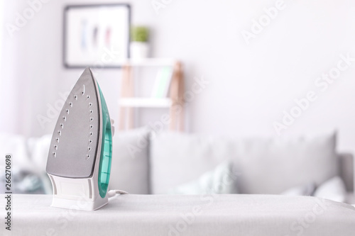 Modern iron on board in room
