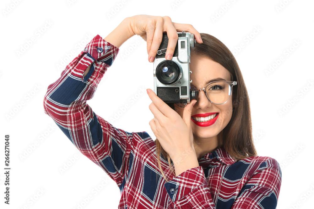 Young female photographer on white background Young female photographer on white background